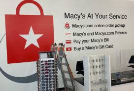 Indoor sign for Macy's at Your Service installed by Premier Signs & Graphics in Dallas